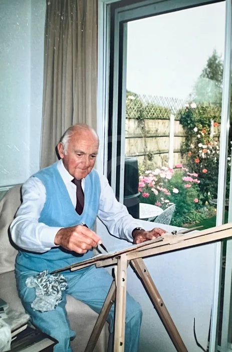 Photo of Sam painting in his Studio 