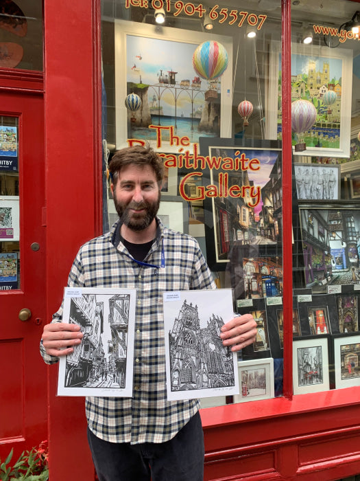 Artist Drawneup with his linocut prints of York